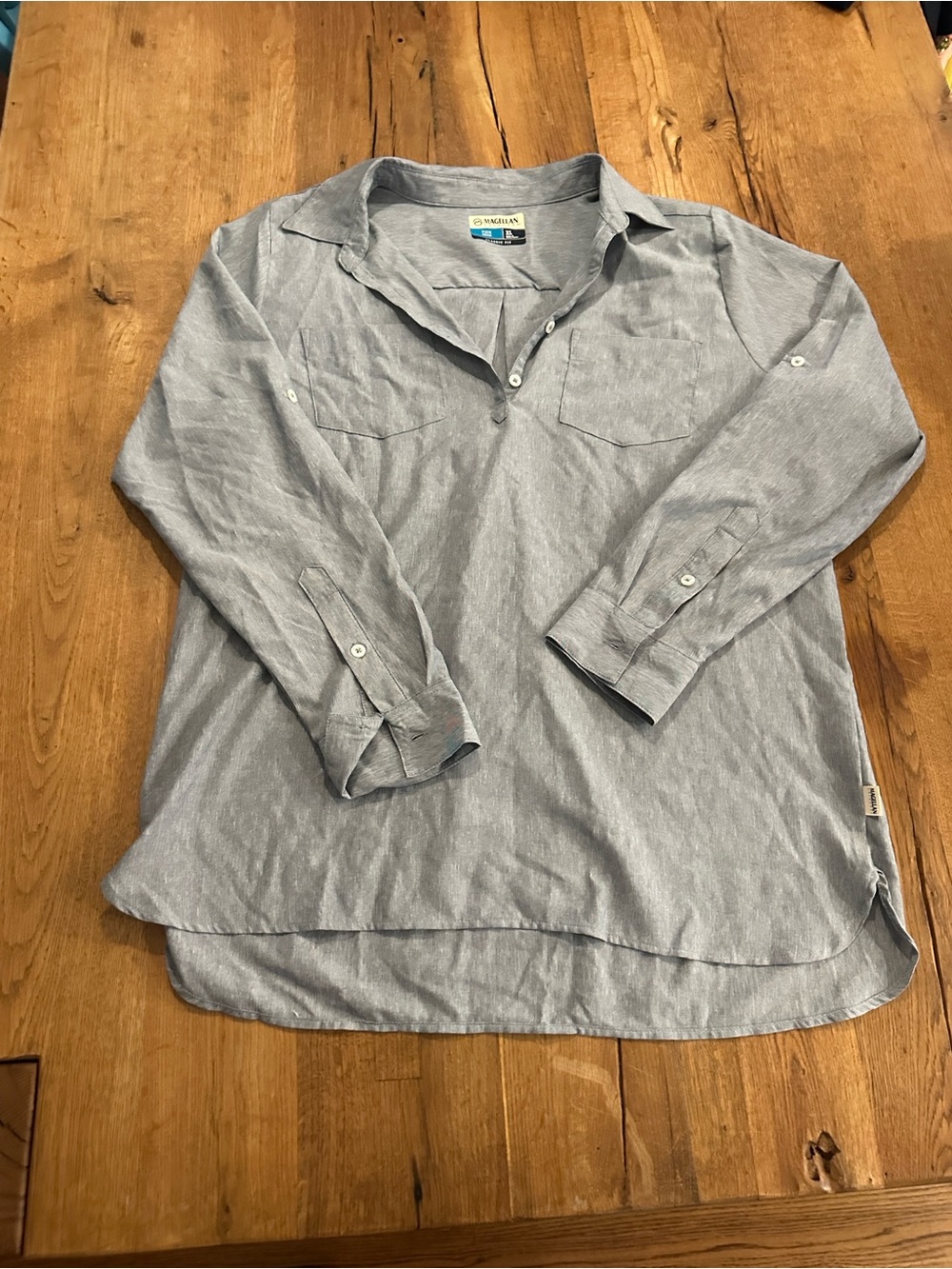 Magellan Fish gear roll tab sleeves top
